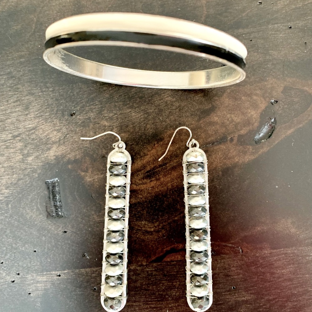 Dangling earrings 7 1/2” and medal bangle.